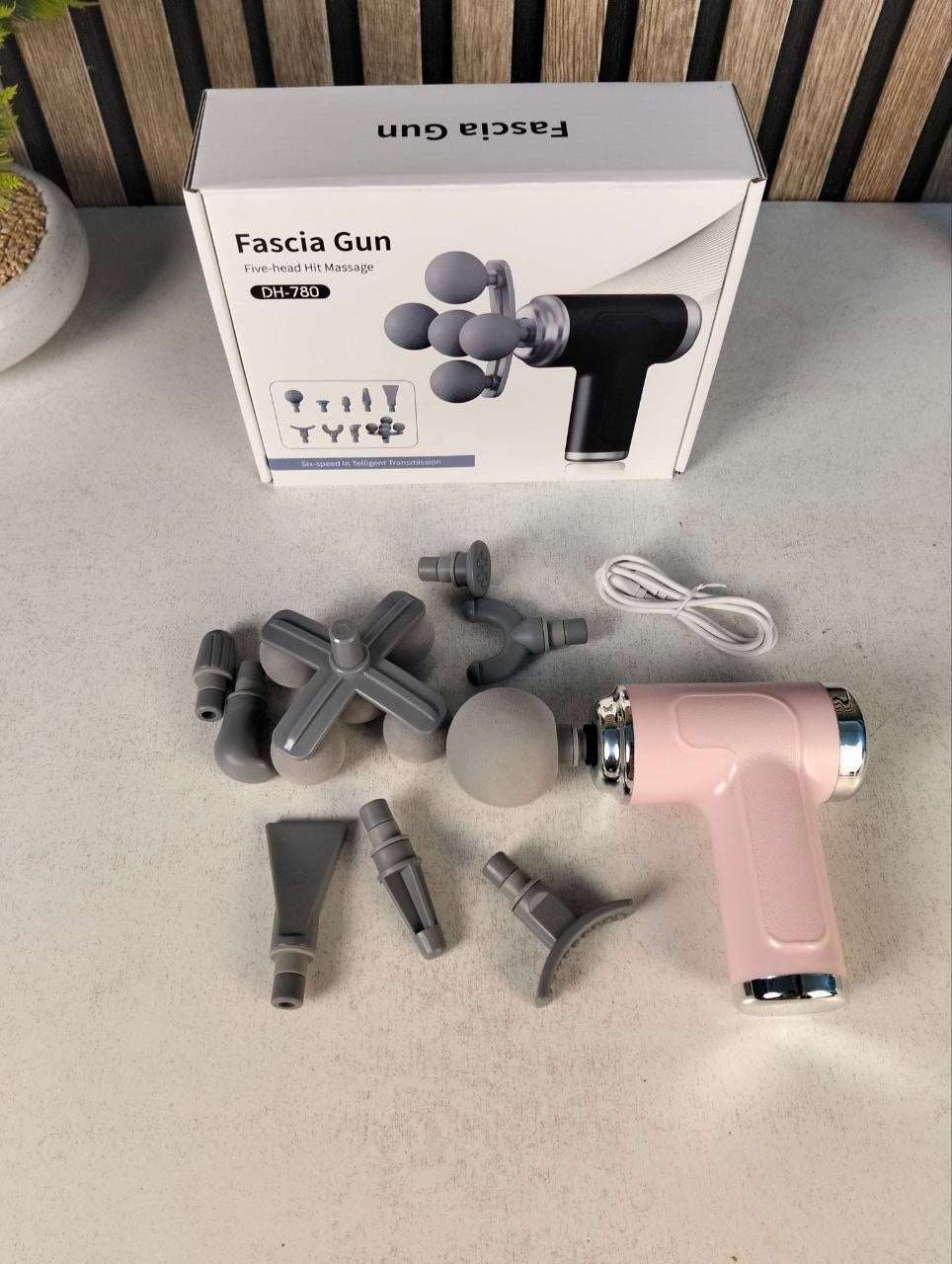 Pistolet-de-Massage-Professionnel-avec-9-T-tes-Interchangeables-pour-Relaxation-Totale-جهاز-تدليك-الجسم-الاحترافي-بـ-9-رؤوس-لتدليك-الأنسجة-العميقة.png