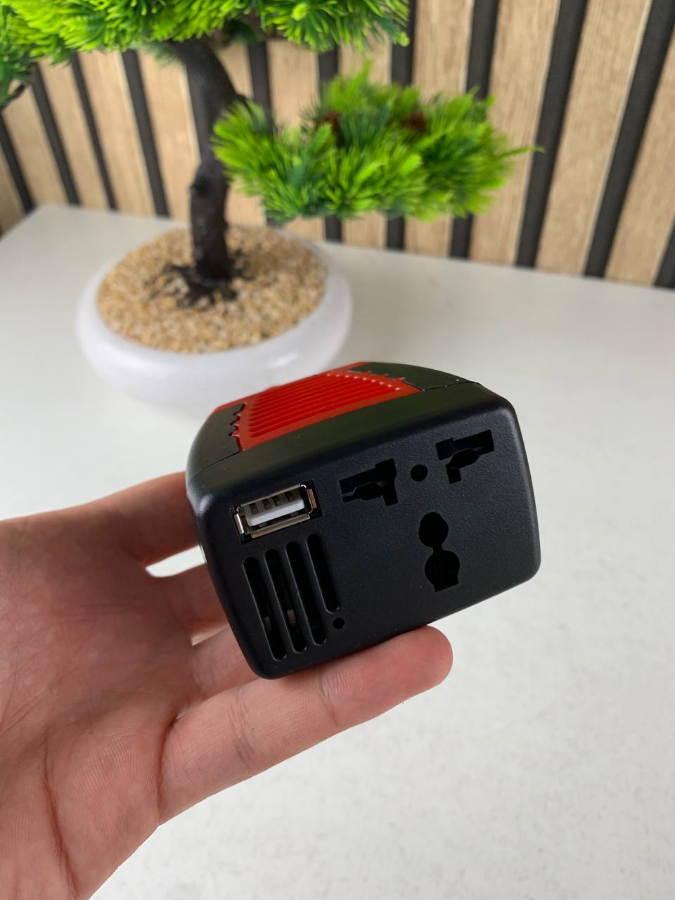 Convertisseur-de-tension-automatique-pour-voitures-100W-DC-12V-AC-220V-محول-تيار-الكهربائي.png