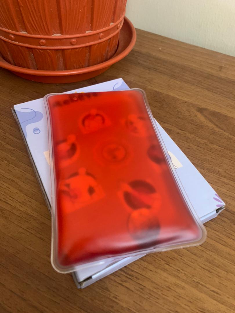 Pochette-de-Gel-Chauffante-R-utilisable-pour-Soulager-les-Dou-leurs.png