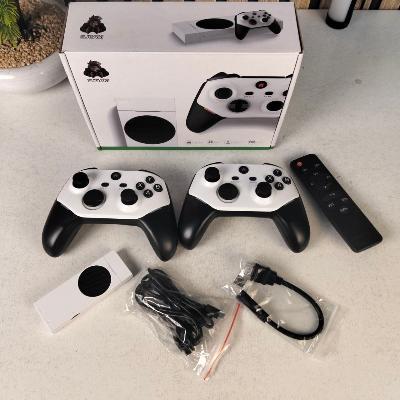 Console-Game-Stick-Retro-4K-M88-avec-30000-Jeux-et-2-Manettes-Sans-Fil-جهاز-ألعاب-الفيديو-ريترو.png
