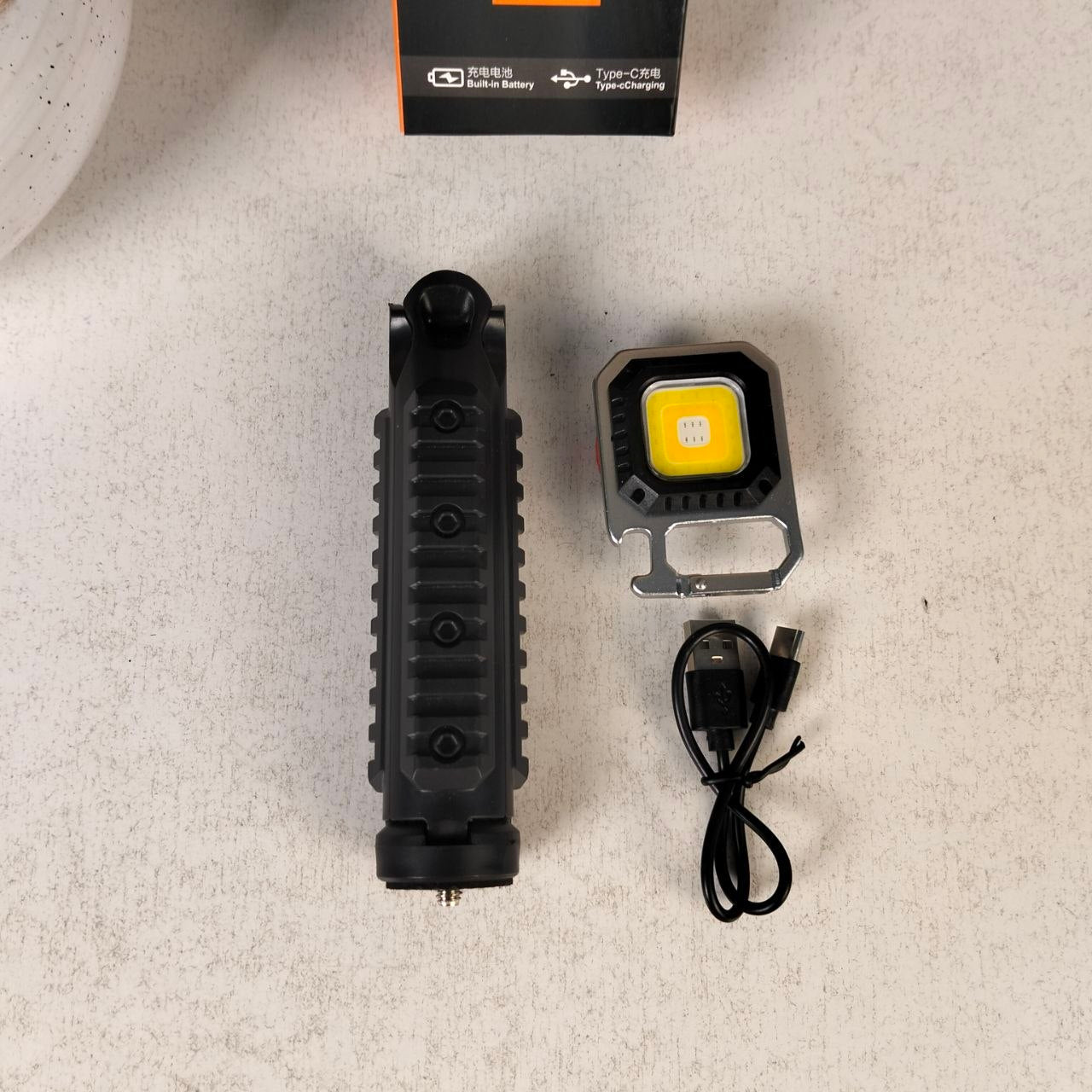 Mini-Lampe-de-Poche-COB-LED-Portable-Rechargeable-avec-Tr-pied-مصباح-متعدد-الوظائف-مع-حامل.png