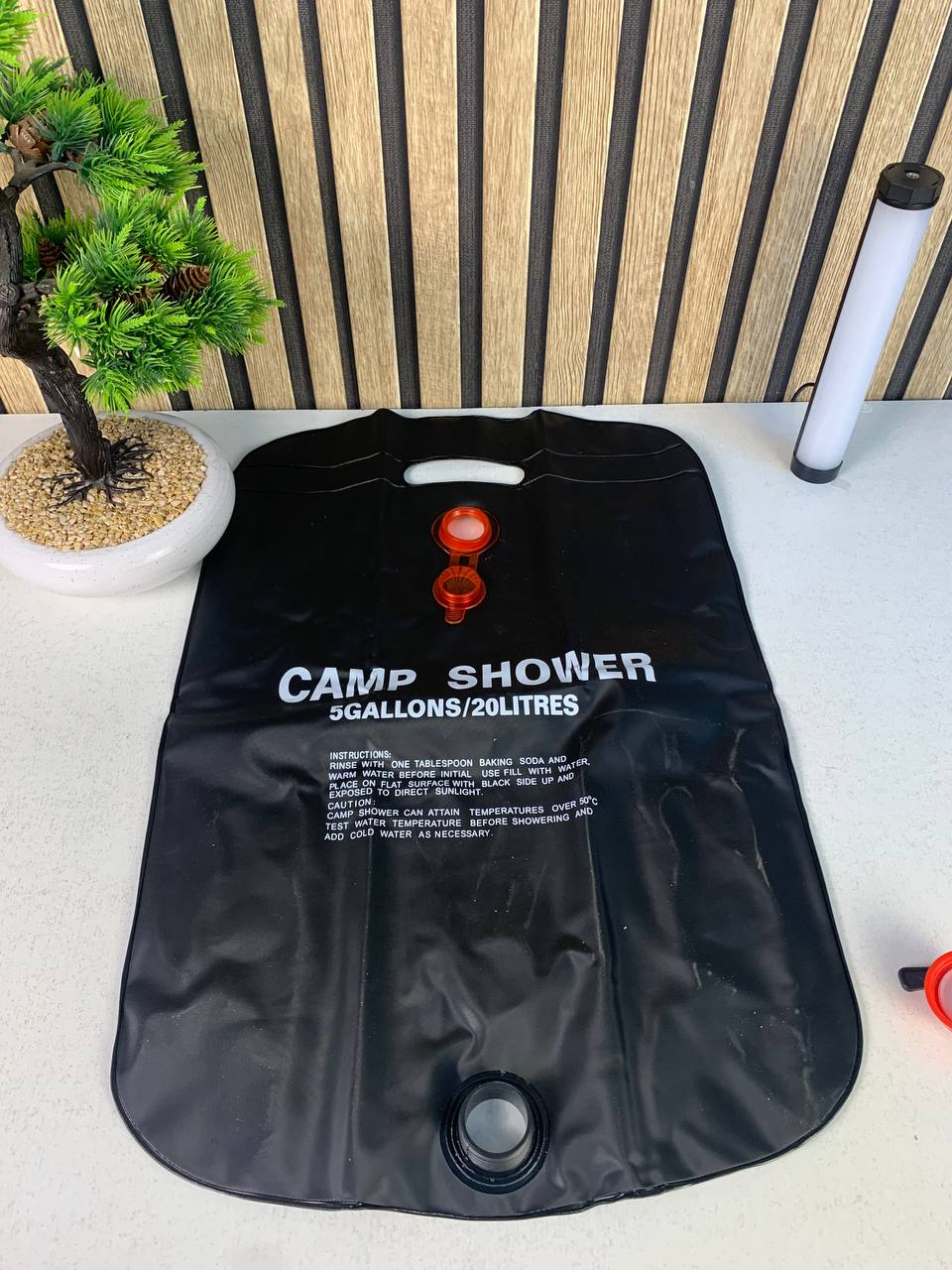 Sac-de-douche-solaire-avec-pommeau-de-douche-interchangeable-20L-حقيبة-الاستحمام-الشمسية-المحمولة-سعة-20-لتر.png