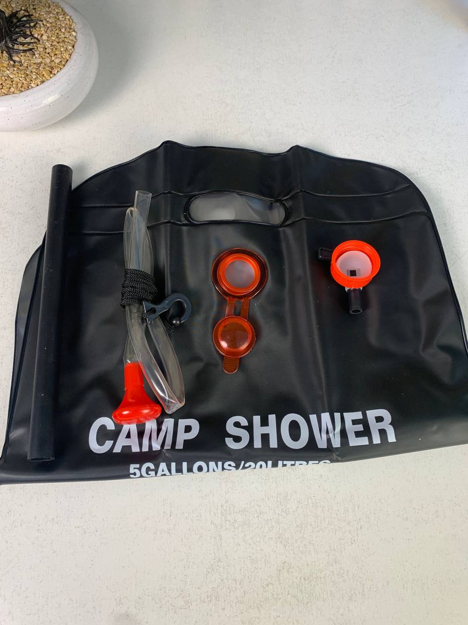 Sac-de-douche-solaire-avec-pommeau-de-douche-interchangeable-20L-حقيبة-الاستحمام-الشمسية-المحمولة-سعة-20-لتر.png