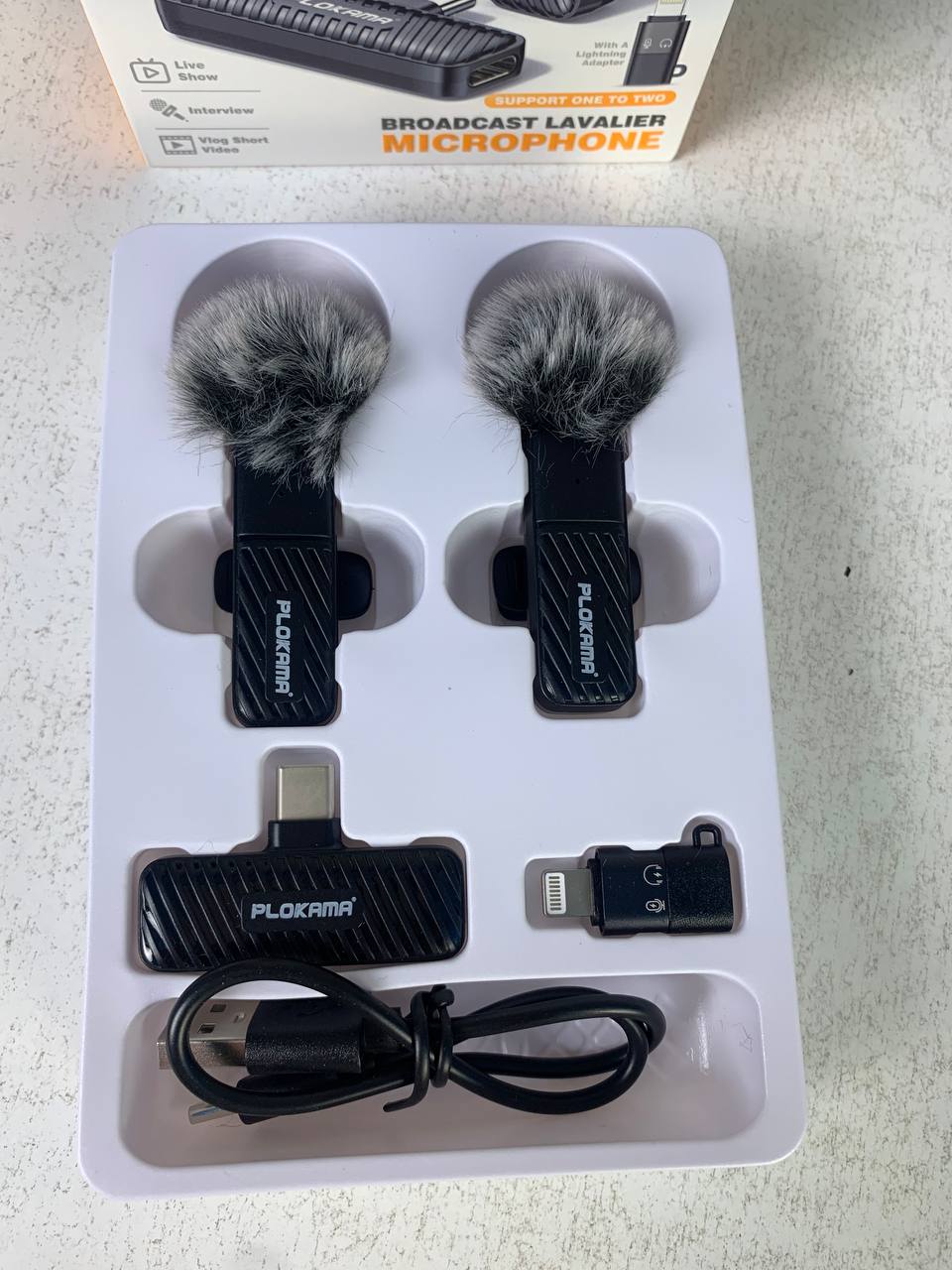 Microphone-cravate-sans-fil-Plokama-VM-20-2-4-GHz-ارتقِ-بصوتك-إلى-المستوى-الاحترافي-مع-ميكروفون-اللاسلكي-المزدوج.png