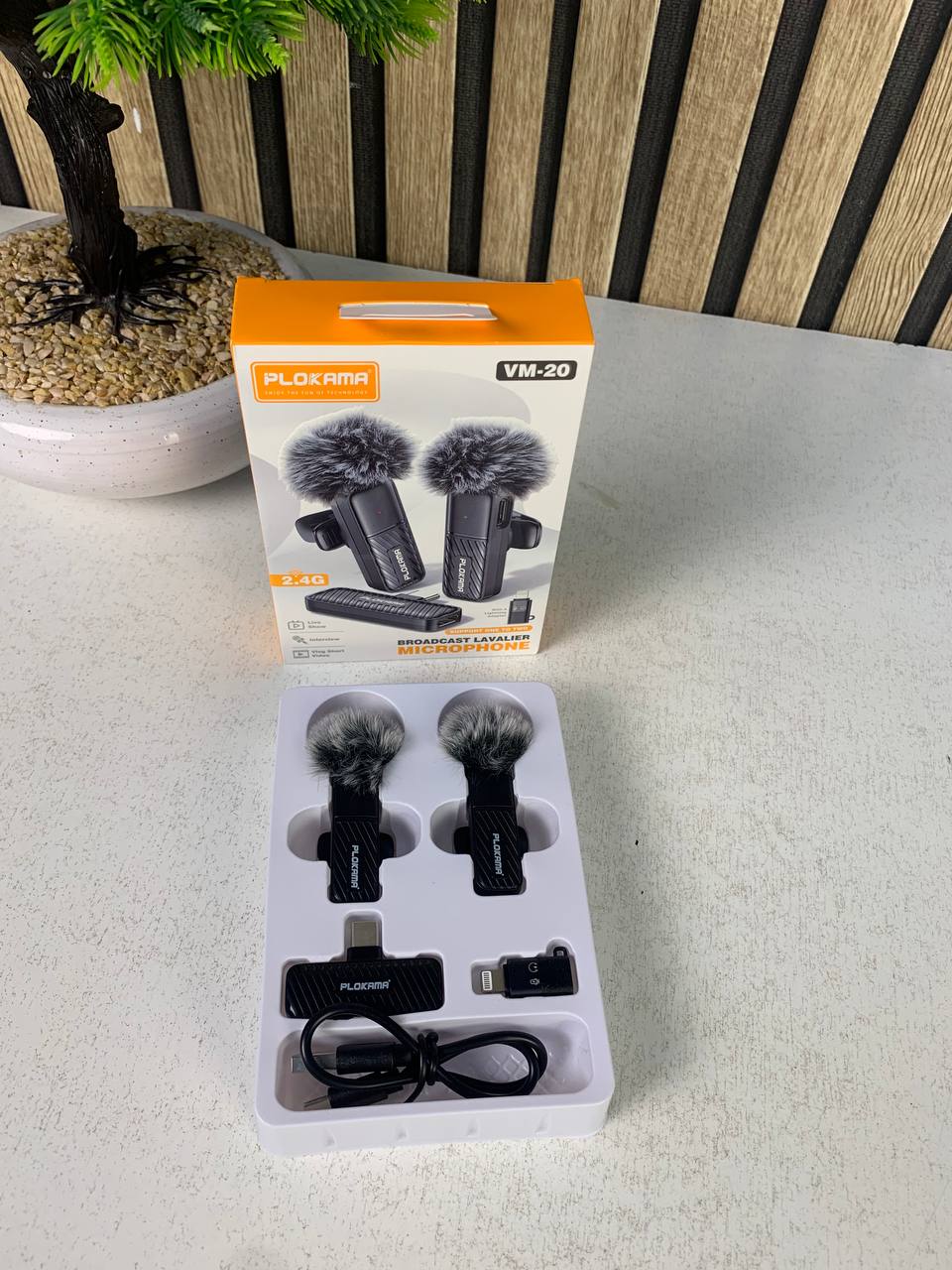 Microphone-cravate-sans-fil-Plokama-VM-20-2-4-GHz-ارتقِ-بصوتك-إلى-المستوى-الاحترافي-مع-ميكروفون-اللاسلكي-المزدوج.png
