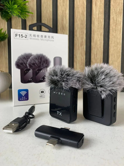 Double-Microphone-Sans-Fil-Professionnel-2en1-pour-iPhone-et-Android-F15-2-ميكروفون-لاسلكي-2قطع-متعدد-المنافذ.png