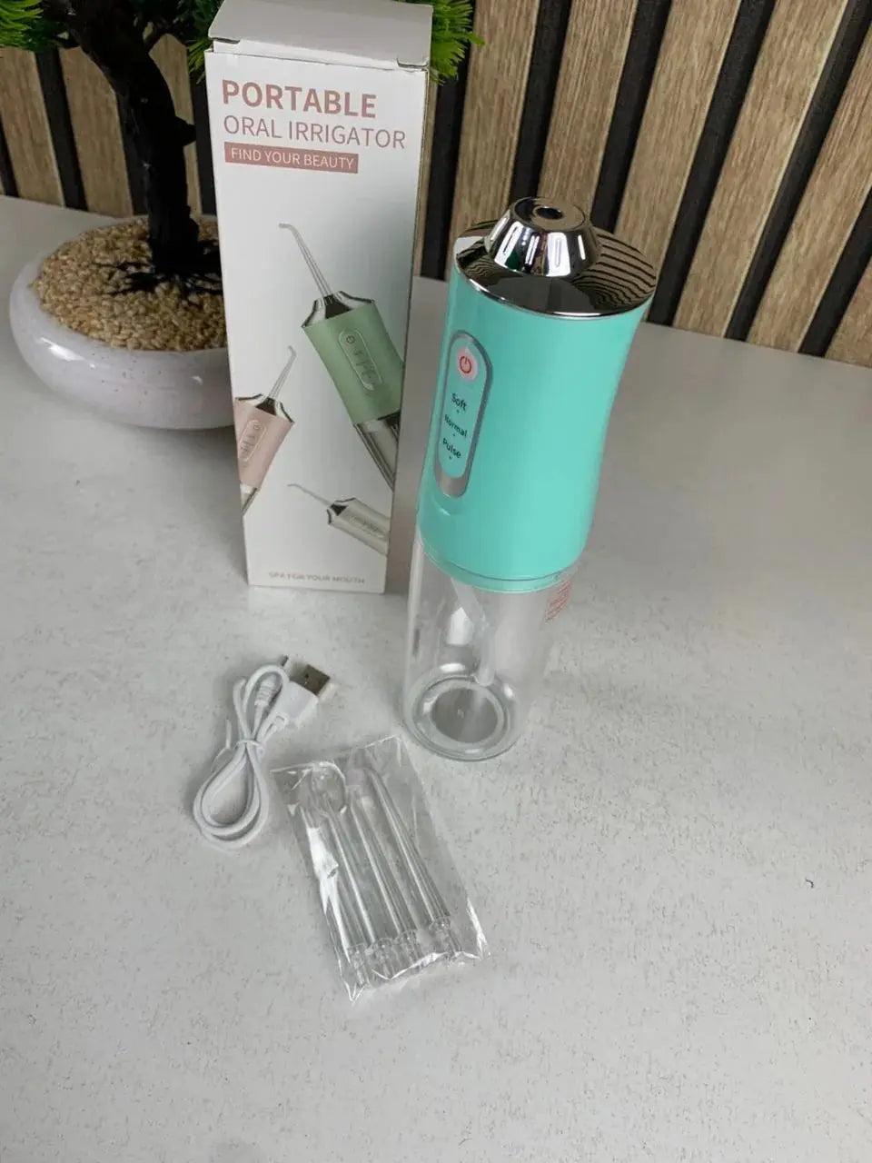 Hydropulseur-dentaire-lectrique-sans-fil-Rechargeable-par-USB-جهاز-تنظيف-الأسنان.png