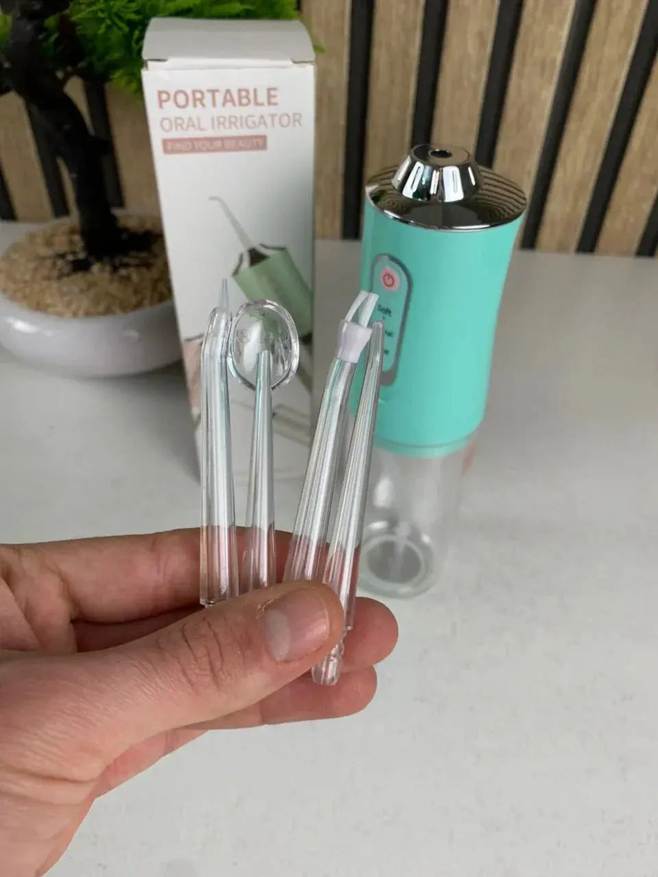 Hydropulseur-dentaire-lectrique-sans-fil-Rechargeable-par-USB-جهاز-تنظيف-الأسنان.png