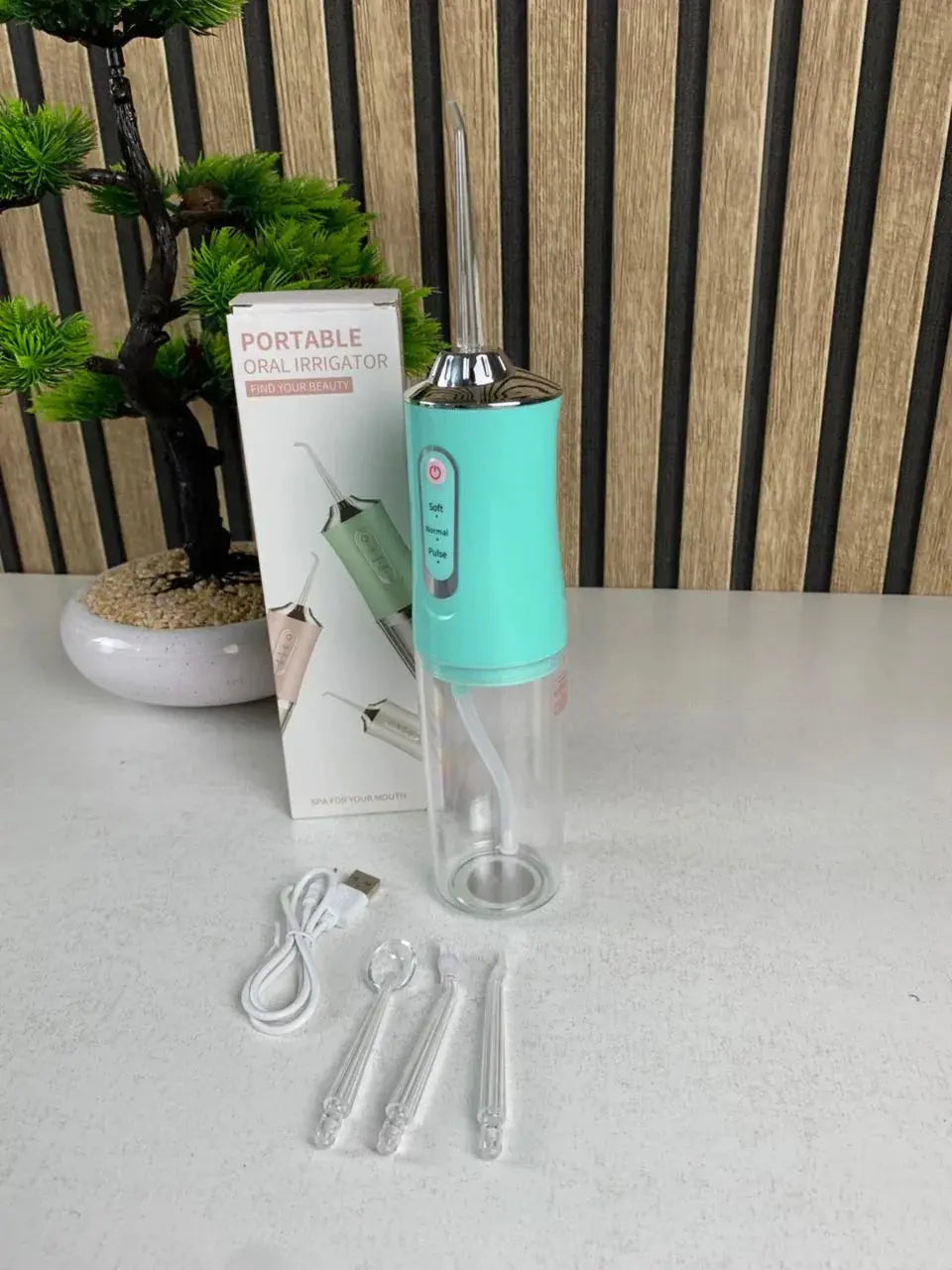 Hydropulseur-dentaire-lectrique-sans-fil-Rechargeable-par-USB-جهاز-تنظيف-الأسنان.png