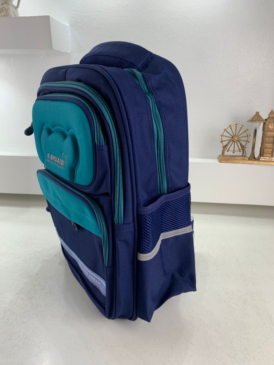 Sac à Dos Scolaire Orthopédique pour Enfants X-SHUAIQI Bleu Ciel – محفظة مدرسية للأطفال أزرق فاتح تنزوت