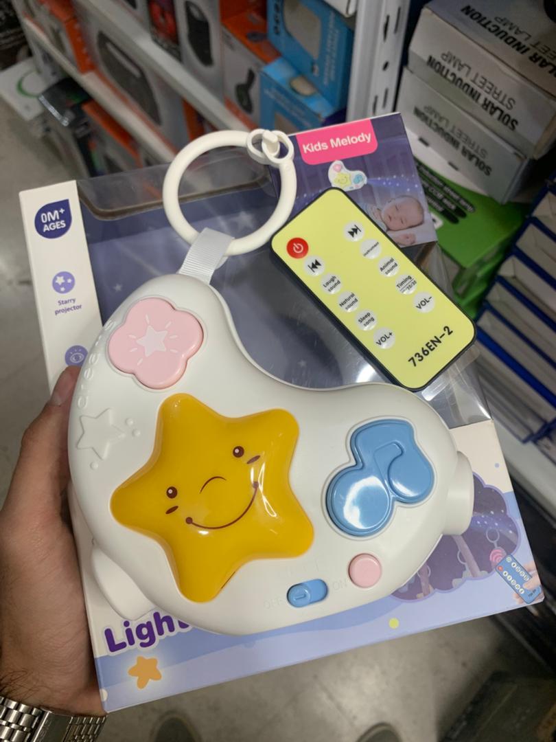 Projecteur veilleuse musicale avec télécommande pour bébé - جهاز عرض ضوئي ليلي موسيقي مع جهاز تحكم عن بعد للطفل تنزوت