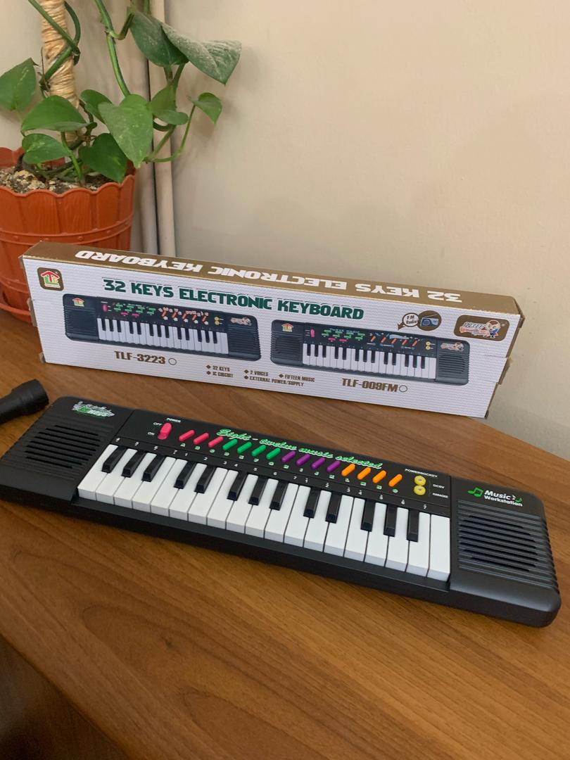 Clavier-lectronique-32-Touches-Sunshine-avec-Microphone-بيانو-إلكتروني-للأطفال.png