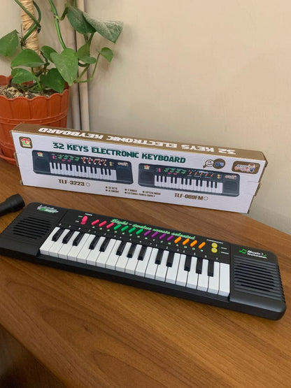 Clavier-lectronique-32-Touches-Sunshine-avec-Microphone-بيانو-إلكتروني-للأطفال.png