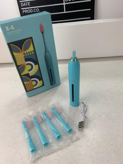 Brosse à Dents Électrique 4 Têtes Incluses Rechargeable et Étanche IPX7 – فرشاة أسنان كهربائية بأربعة رؤوس تنزوت