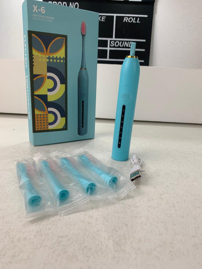 Brosse à Dents Électrique 4 Têtes Incluses Rechargeable et Étanche IPX7 – فرشاة أسنان كهربائية بأربعة رؤوس تنزوت