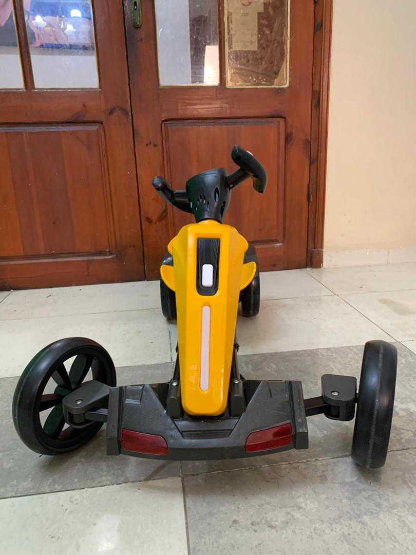 Voiture-karting-lectrique-pliable-12V-pour-enfants-avec-marche-arri-re-سيارة-سباق-كهربائية-للأطفال.png