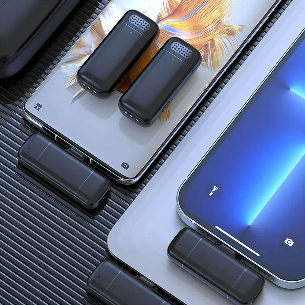 Double-Microphone-sans-Fil-pour-Iphone-et-Android-avec-tui-de-Charge-ميكروفون-إحترافي-مزدوج.png