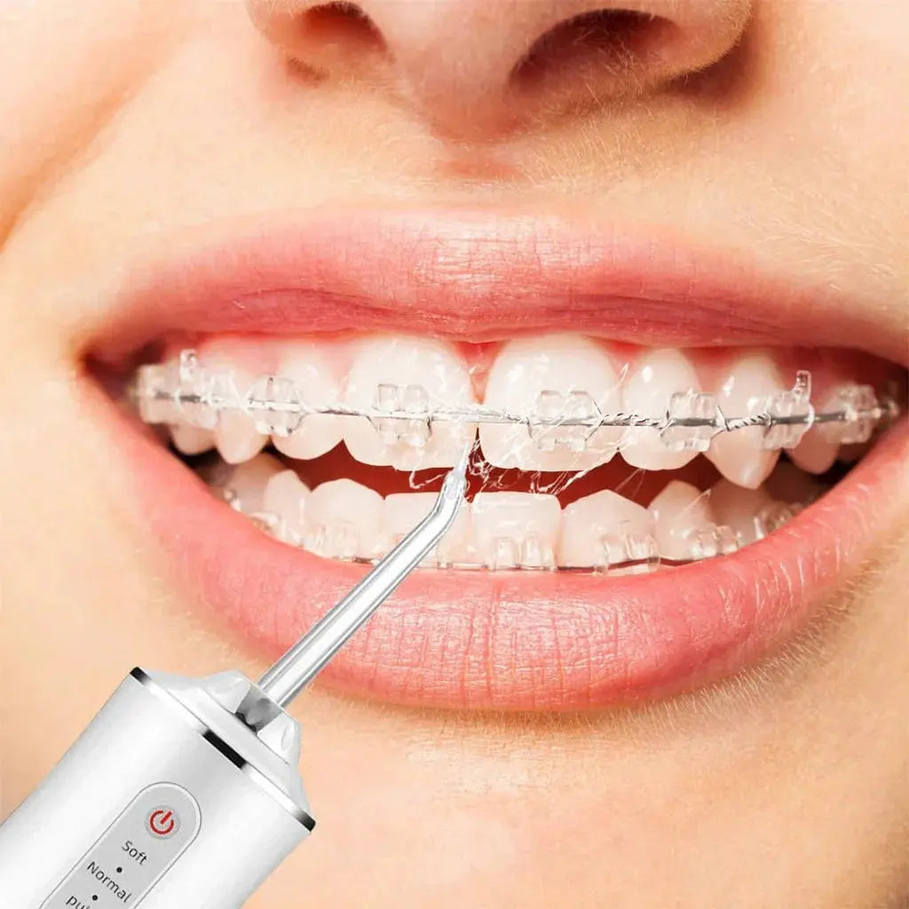 Hydropulseur-dentaire-lectrique-sans-fil-Rechargeable-par-USB-جهاز-تنظيف-الأسنان.png