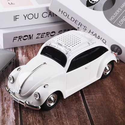 Haut-parleur-Bluetooth-sans-fil-Beetle-Voiture-سيارة-مكبر-صوت-بلوتوث-لاسلكي.png