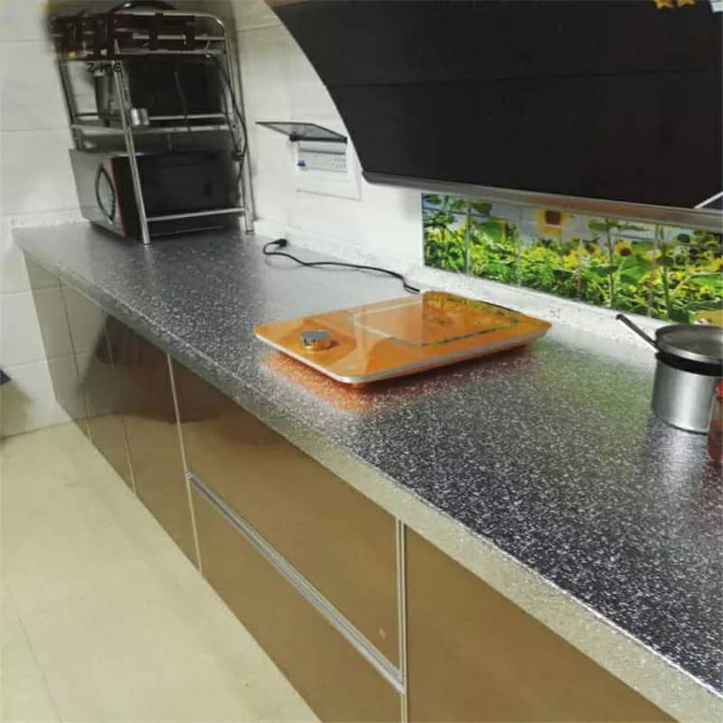 Autocollant d'aluminium auto-adhésif 5M Anti-l'huile pour cuisine تنزوت