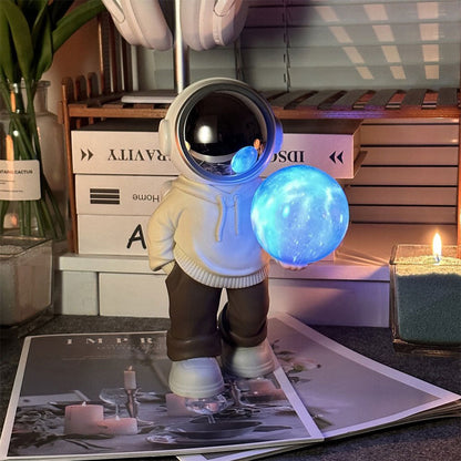 Enceinte-bluetooth-et-lampe-astronaute-id-ale-pour-la-d-coration-de-chambre-YM-121-مصباح-ومكبر-صوت-بلوتوث.png