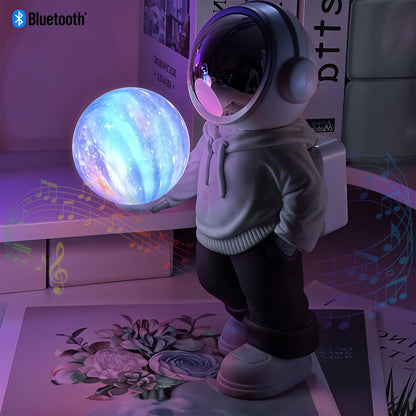 Enceinte-bluetooth-et-lampe-astronaute-id-ale-pour-la-d-coration-de-chambre-YM-121-مصباح-ومكبر-صوت-بلوتوث.png