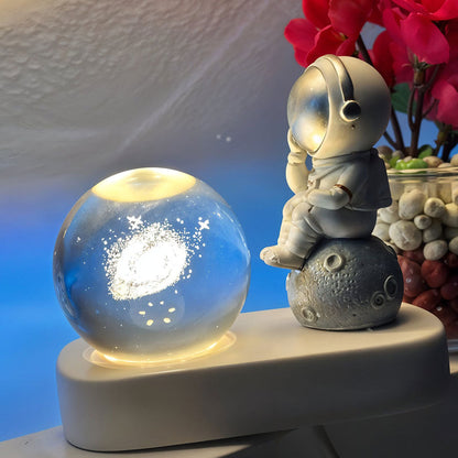Veilleuse-3D-en-Forme-de-Boule-de-Cristal-pour-Astronaute.png